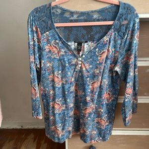 Lucky Brand knit shirt with lace shoulder front and d around the back.